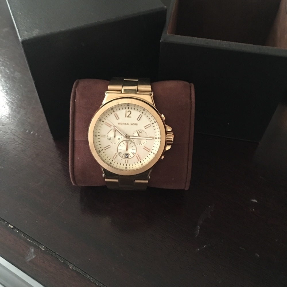 Men’s gold Michael Kors watch